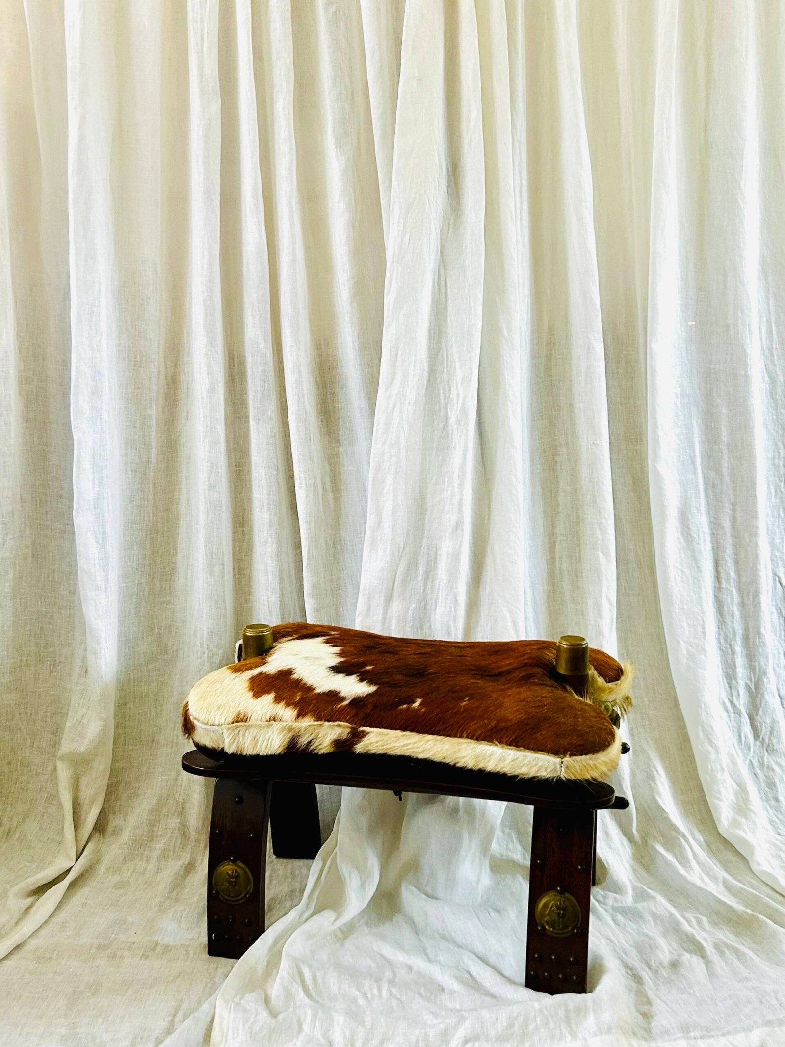 Vintage Moroccan camel saddle stool with cowhide upholstery ๐. - Image 2