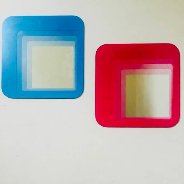 A pair of 1999 IKEA Hylkje mirrors