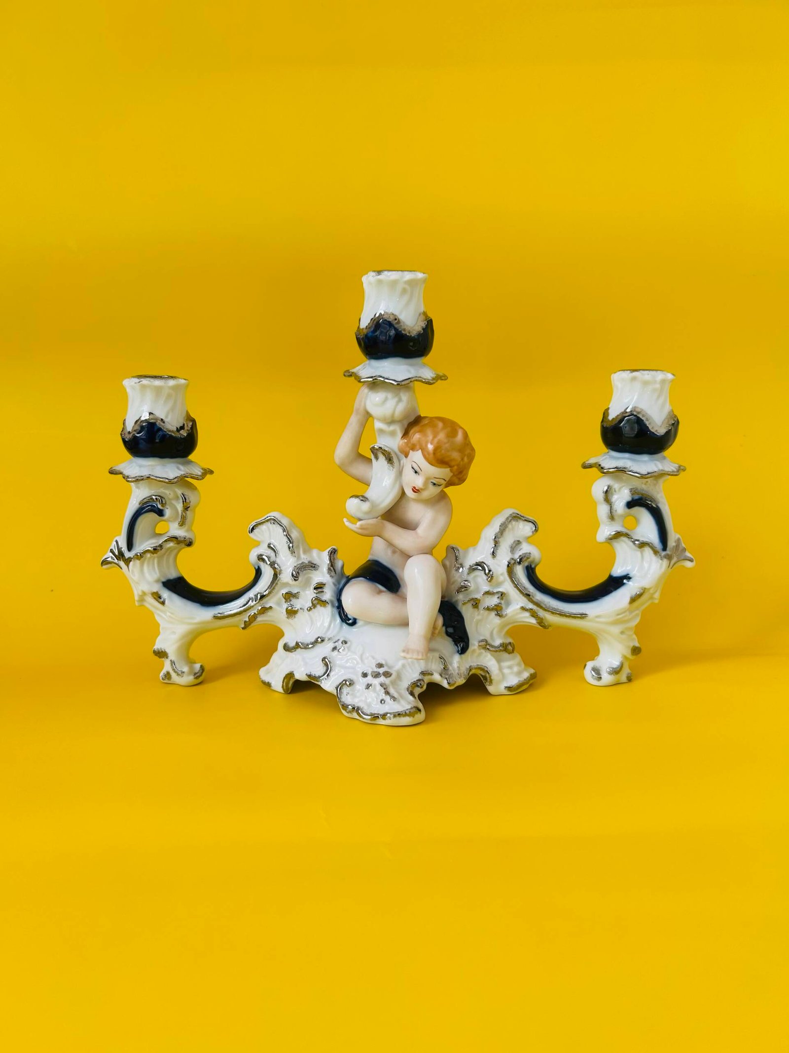 Porcelain Putto Figurine Candelabra